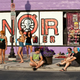 Illustration for article titled Noir Leather Bikini Car Wash Meetup Pictures